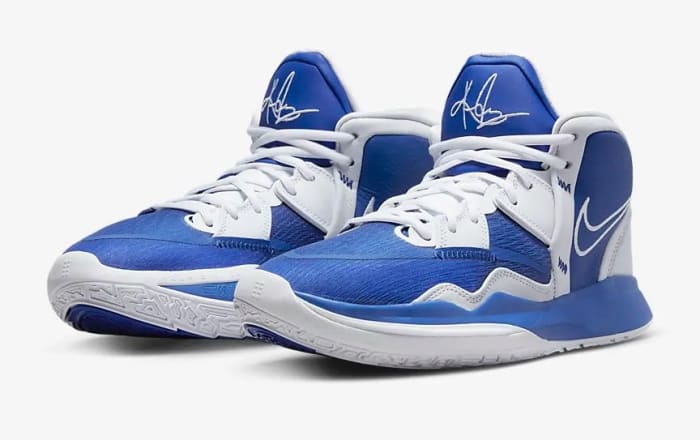 View of blue and white Nike Kyrie shoes.